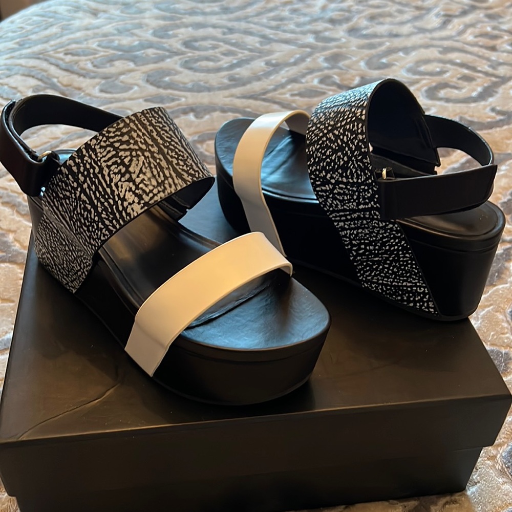White and black Jazzy platform sandals.Size 37.Great condition.
